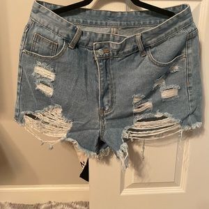 Women’s non-stretch denim shorts. Size large 8/10.